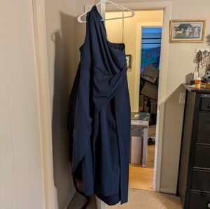 Kay Unger blue one shoulder jumpsuit.